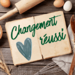 La recette d'un changement professionnel réussi c'est écrit dans un livre avec des ustensiles de cuisine autour